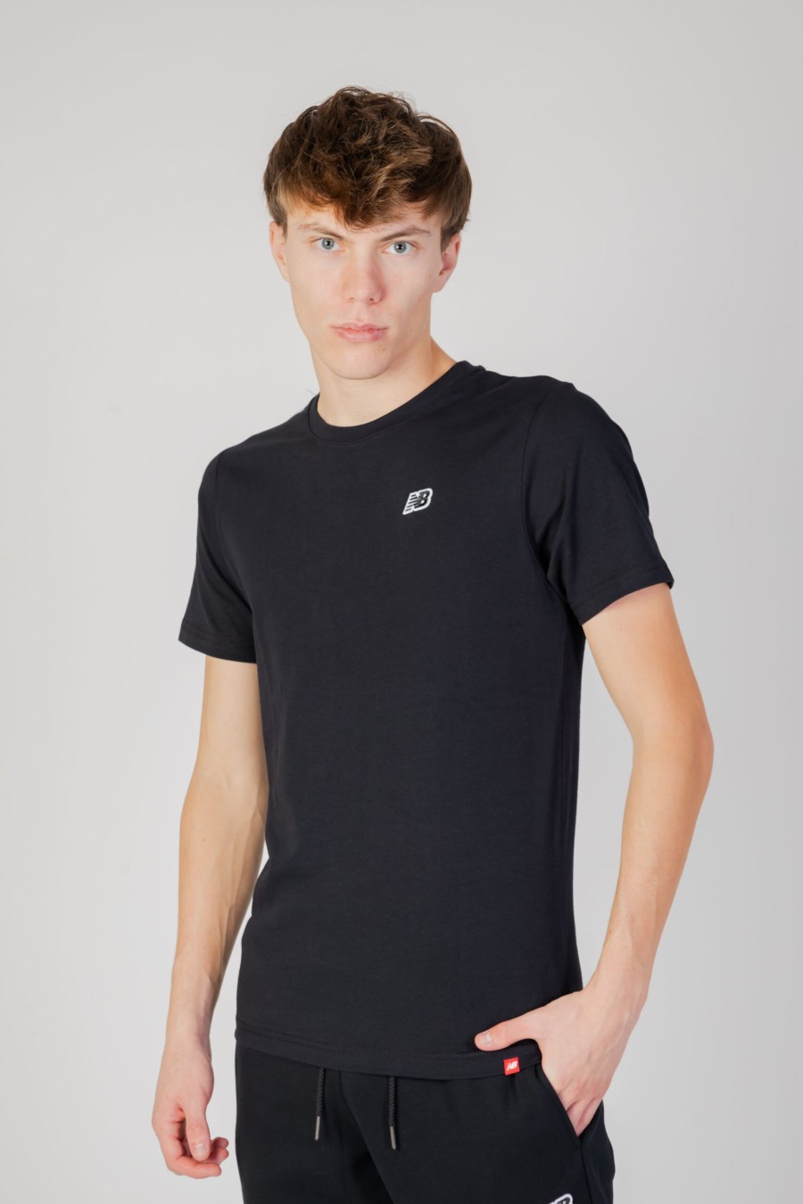 Uomo New Balance | T-Shirt New Balance 23600 Nero